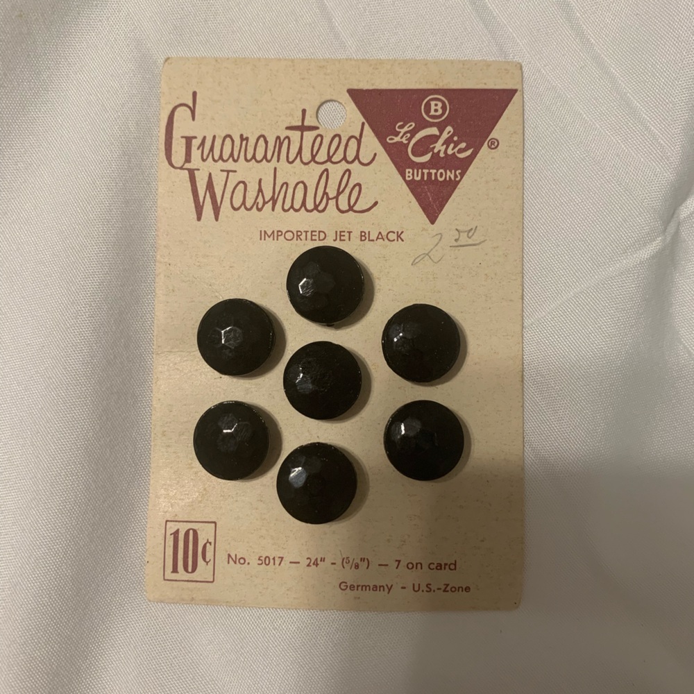 Vintage antique buttons. Black shiny. On original 10 cent card.